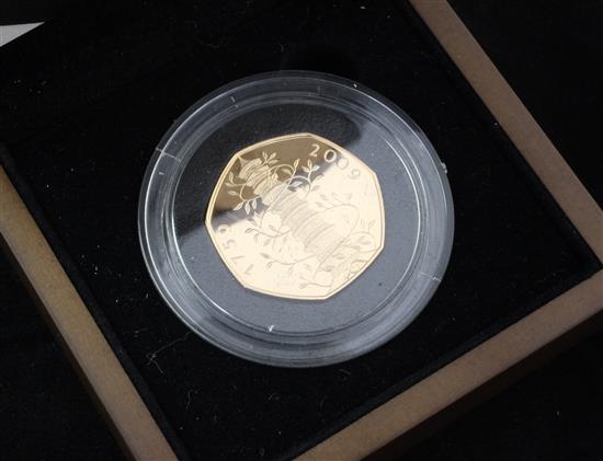 A cased Royal Mint 2009 UK Kew Gardens 50 pence gold proof coin,